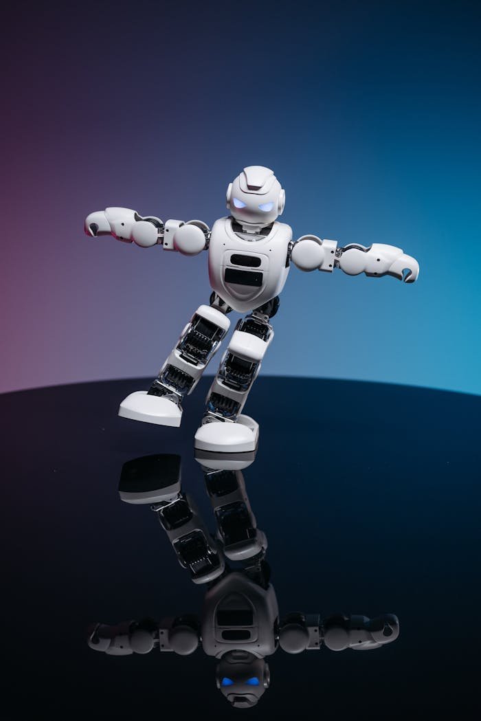 Mastering the First Impression: Your intriguing post title goes here A white robot toy posed dynamically on a glossy reflective surface with a gradient background.