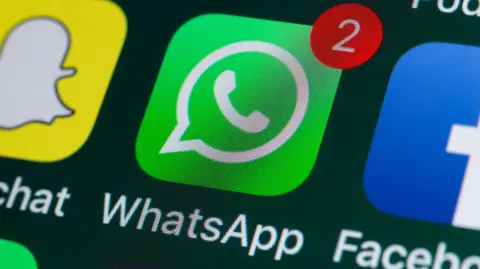 Getty Images A WhatsApp logo displayed on a phone screen
