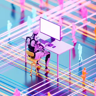 A robot works at an office desk with human workers in the background