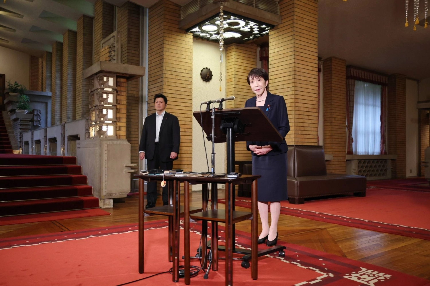 Prime Minister Sanae Takaichi speaks to reporters at her official residence earlier this month.