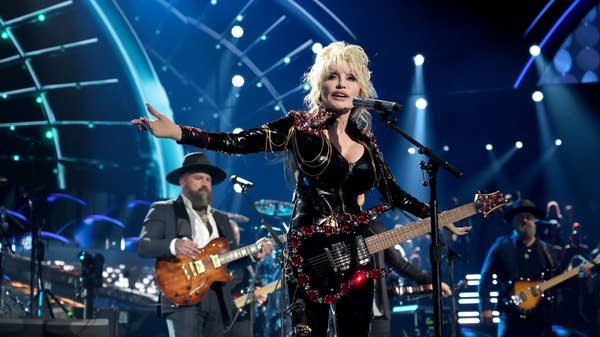 Above, Dolly Parton performs onstage during the 37th Annual Rock & Roll Hall of Fame Induction Ceremony in November 2022.