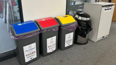 BBC Recycling bins in an office.